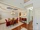 Formal dining room with decorative ceiling, wainscoting, chandelier, and hardwood flooring at 712 English Tudor Ln, Charlotte, NC 28211