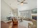 Spacious living room featuring hardwood floors, fireplace, and high vaulted ceilings at 712 English Tudor Ln, Charlotte, NC 28211