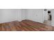 Empty bedroom featuring wood flooring, a closet, and an open doorway at 725 Plantation Rd, Lancaster, SC 29720