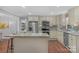 Updated kitchen with stainless steel appliances, granite countertops, and a central island at 725 Plantation Rd, Lancaster, SC 29720