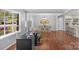 Open floor plan featuring a home office with hardwood floors flowing into a dining room at 725 Plantation Rd, Lancaster, SC 29720