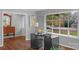 Bright home office with hardwood floors and a large window at 725 Plantation Rd, Lancaster, SC 29720