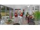 Bright sunroom with tile flooring and sliding doors to enjoy the outdoor view at 725 Plantation Rd, Lancaster, SC 29720
