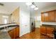 Kitchen with wooden cabinets, stainless steel appliances, and a double sink at 733 Jones Branch Rd, Fort Mill, SC 29715