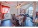 Charming dining room with hardwood floors, neutral color palette and large windows at 7505 Torphin Ct, Charlotte, NC 28269