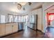 Modern kitchen with stainless steel appliances, granite countertops, and dark hardwood floors at 7505 Torphin Ct, Charlotte, NC 28269