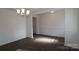 Bright dining room with hardwood floors and wainscoting at 8224 Annsborough Nw Dr, Concord, NC 28027