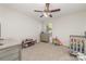 Bedroom includes a neutral color scheme, window and space for a crib at 8411 Washoe Pine Ln, Charlotte, NC 28215