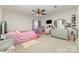 bedroom features a plush rug, bright colors and plenty of space for play at 8411 Washoe Pine Ln, Charlotte, NC 28215