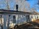 Rear view of house showing back door and sliding glass doors at 9012 Bremerton Ct, Charlotte, NC 28227