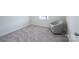 Bedroom with neutral carpet, chair, and natural light at 9015 Ramsford Ct, Mint Hill, NC 28227