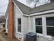 Brick chimney and central AC unit visible at 905 Saluda St, Rock Hill, SC 29730