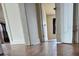 Long hallway with light brown laminate flooring at 905 Saluda St, Rock Hill, SC 29730