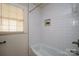 Classic bathroom with a white tiled shower and a recessed plant holder at 105 W 21St St, Kannapolis, NC 28081