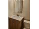 Bathroom with modern vanity and gold mirror at 105 W 21St St, Kannapolis, NC 28081