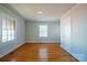 Bedroom featuring hardwood floors, a built-in closet, and bright natural light at 105 W 21St St, Kannapolis, NC 28081