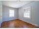 Inviting bedroom with hardwood floors and natural light, offering a cozy retreat at 105 W 21St St, Kannapolis, NC 28081