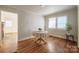 Cozy dining room with hardwood floors, natural light, and neutral tones perfect for intimate gatherings at 105 W 21St St, Kannapolis, NC 28081