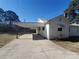 White house exterior with carport and yard at 105 W 21St St, Kannapolis, NC 28081