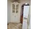 Kitchen corner with white cabinets and wood flooring at 105 W 21St St, Kannapolis, NC 28081