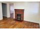 Living room with hardwood floors and brick fireplace at 105 W 21St St, Kannapolis, NC 28081