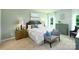 Relaxing bedroom with a plush bed and calming color scheme at 10630 Tuff Ln, Davidson, NC 28036