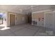 Covered patio area with water fountains adjacent to the pool at 10630 Tuff Ln, Davidson, NC 28036