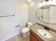 Clean bathroom with granite countertop vanity and updated fixtures at 118 Cadbury Ln, Fort Mill, SC 29715