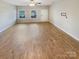 Spacious living room featuring hardwood floors and ample natural light at 118 Cadbury Ln, Fort Mill, SC 29715