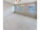 Large main bedroom with light gray walls and plush carpeting at 118 Cadbury Ln, Fort Mill, SC 29715