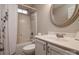 Neutral bathroom featuring a single sink vanity, toilet, bathtub and shower with curtain at 12016 Regent Ridge Ln, Charlotte, NC 28278