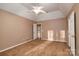 Cozy bedroom featuring neutral walls, carpet, and a bright atmosphere with a ceiling fan at 12016 Regent Ridge Ln, Charlotte, NC 28278