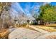 Charming home with well-maintained landscaping and a driveway at 12104 Baywoods Dr, Tega Cay, SC 29708