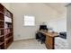 Home office features a window, desk, and carpeted floor at 12104 Baywoods Dr, Tega Cay, SC 29708