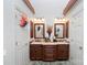 Double vanity bathroom with dark wood cabinets at 1548 Summit View Dr, Rock Hill, SC 29732