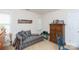 Cozy bedroom featuring a patterned couch and wooden armoire at 1548 Summit View Dr, Rock Hill, SC 29732