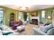 Comfortable Gathering room with green walls and a fireplace at 1548 Summit View Dr, Rock Hill, SC 29732