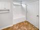 Bathroom with shower, tub and tiled floor at 1633 Barroso Ln, Charlotte, NC 28213