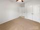 Bright bedroom with carpet and double doors at 1633 Barroso Ln, Charlotte, NC 28213