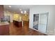 Kitchen with island, granite countertops and sliding glass doors to a patio at 164 N Cromwell Dr, Mooresville, NC 28115