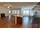 Open concept kitchen with island and stainless steel appliances at 164 N Cromwell Dr, Mooresville, NC 28115