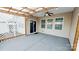 Spacious patio with ceiling fan and sliding glass door access at 164 N Cromwell Dr, Mooresville, NC 28115