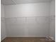 Walk-in closet featuring carpet floors and a wire shelf at 164 N Cromwell Dr, Mooresville, NC 28115