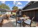 Inviting outdoor deck with dining table, lounge area, overhead lighting, and a cozy ambiance at 1740 Wilmore Dr, Charlotte, NC 28203