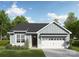 One-story home with gray siding, stone accents, and a two-car garage at 2087 Bonds Ln, Fort Mill, SC 29715