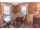 Formal dining room with hardwood floors, and a charming chandelier at 2541 Pinewood Rd, Gastonia, NC 28054