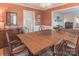 Bright dining room with hardwood floors and a view into the living room at 2541 Pinewood Rd, Gastonia, NC 28054