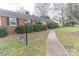 Brick ranch house with landscaped yard and walkway at 2541 Pinewood Rd, Gastonia, NC 28054