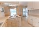 Bright eat-in kitchen with ample cabinetry and a view to the backyard at 2541 Pinewood Rd, Gastonia, NC 28054