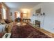 Spacious living room with a marble fireplace and hardwood floors at 2541 Pinewood Rd, Gastonia, NC 28054